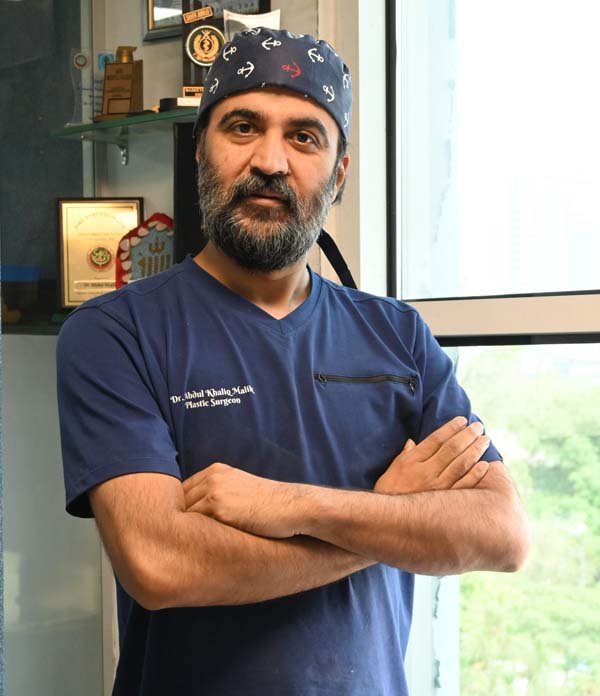 Dr. Abdul Khaliq performing liposuction in Islamabad